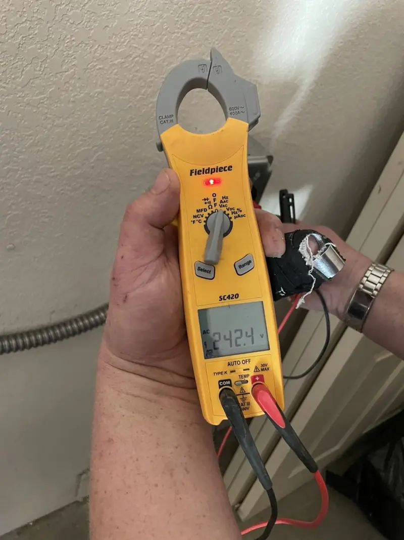 Voltage testing with clamp meter during Whole House Surge Protector in Checotah